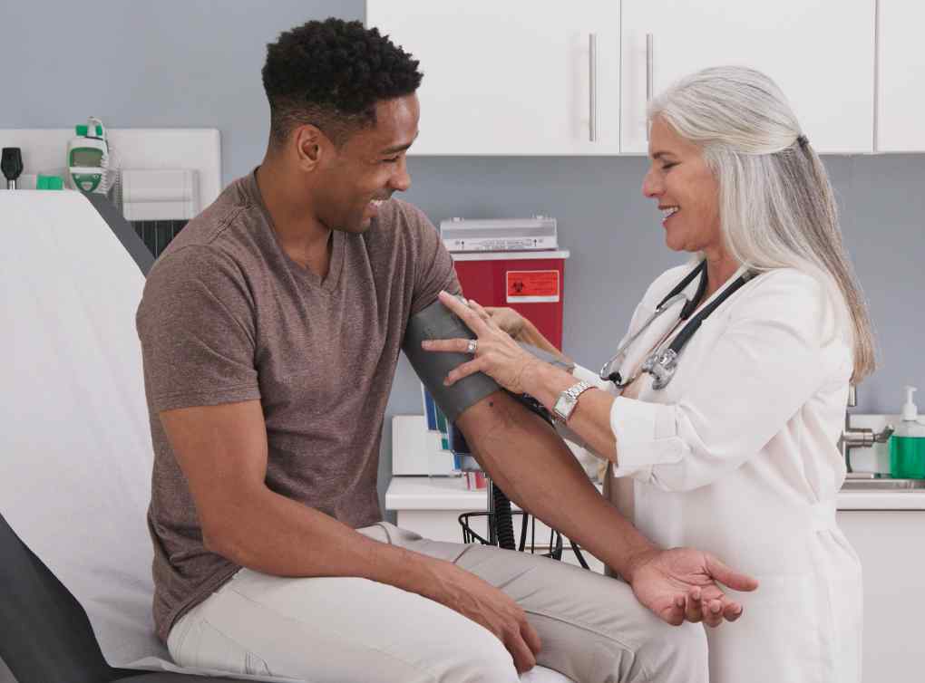 Doctor checking up on patient