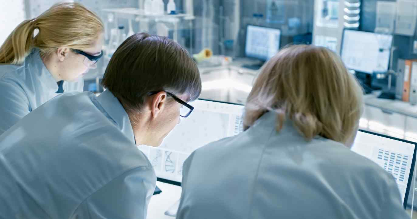 Doctors examining data