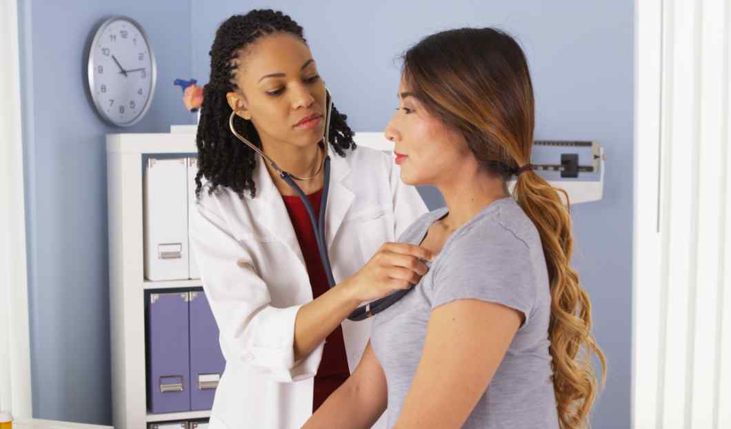 Doctor examining patient